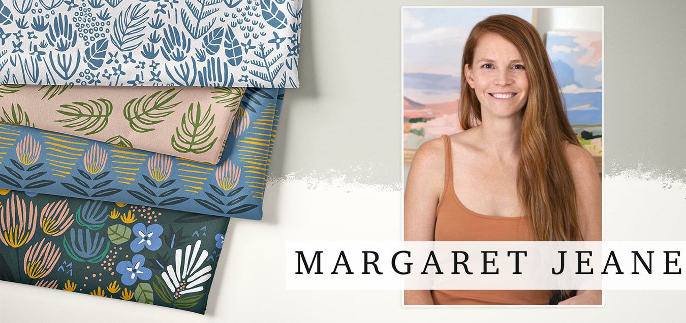 Folded fabrics with botanical prints in blue, pink, and green, beside a portrait of designer Margaret Jeane