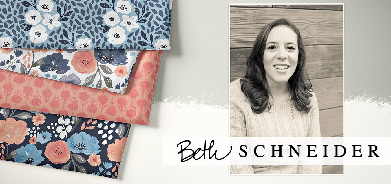 Stacked floral fabric bolts in blue, coral, and navy beside a black and white portrait of designer Beth Schneider