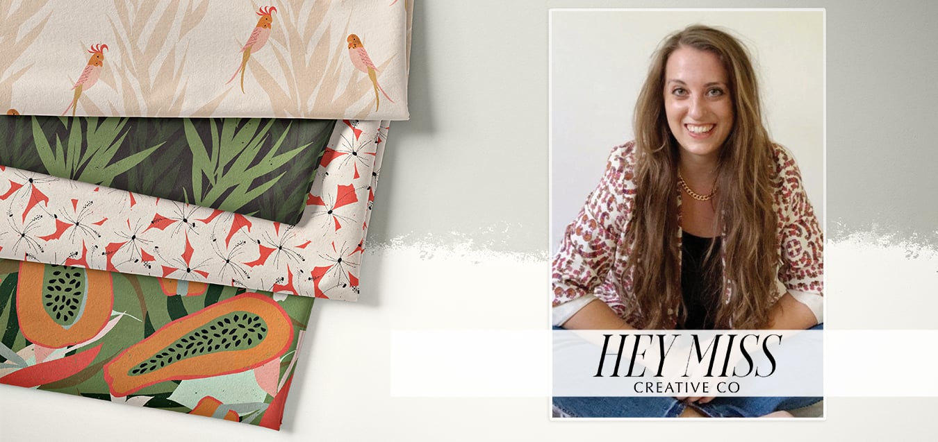 Folded fabric stack with parrot, tropical leaf, floral, and papaya prints beside a portrait of a smiling woman for Hey Miss Creative Co