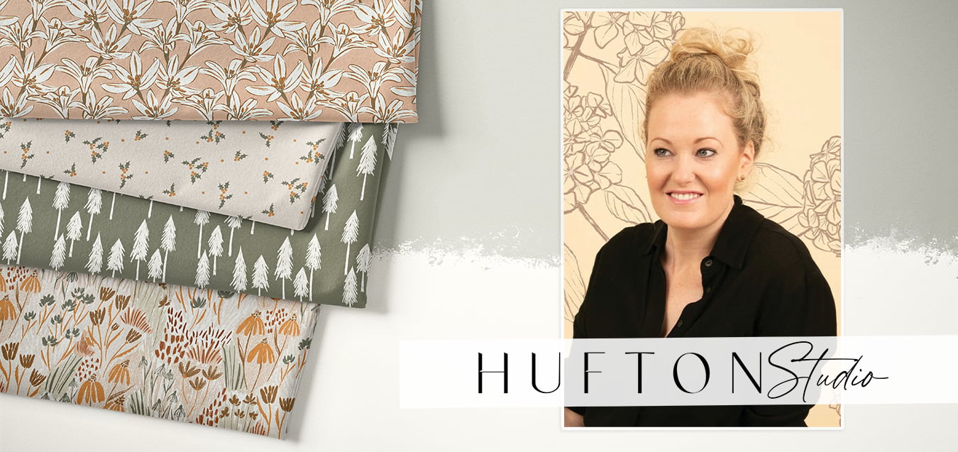 Folded fabrics with lily, holly, pine tree, and wildflower prints beside a portrait of a smiling designer for Hufton Studio.