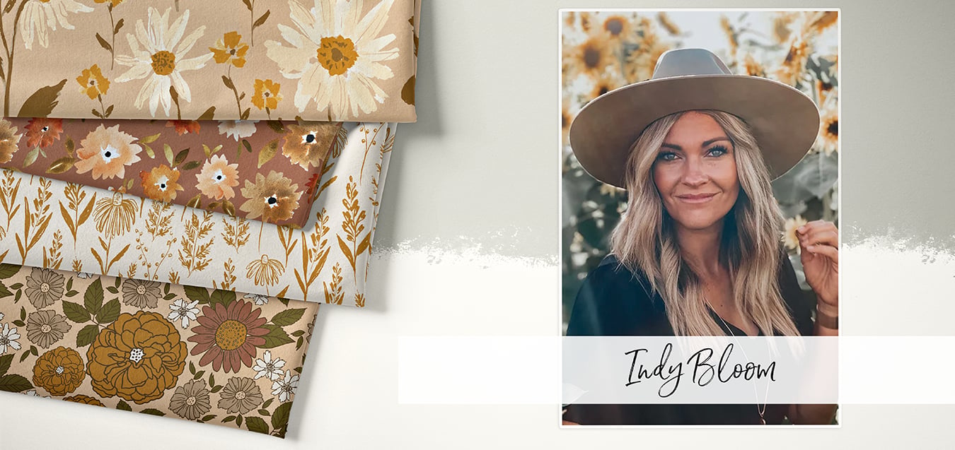 Folded floral fabrics in tan, rust, and gold tones beside a photo of designer Indy Bloom wearing a hat.