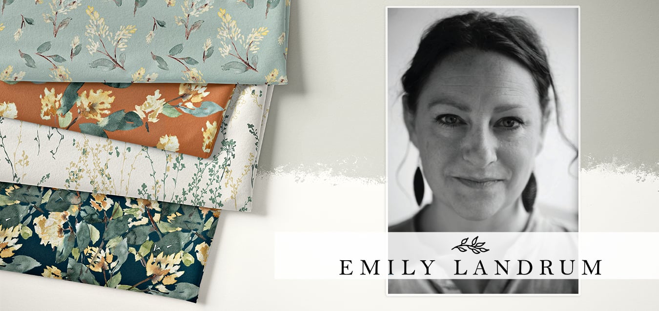 Folded floral fabrics in sage, rust, cream, and navy with leaf prints, beside a black-and-white portrait of designer Emily Landrum