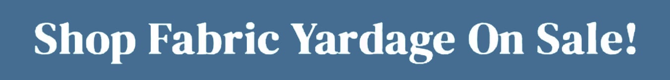 White bold text reading "Shop Fabric Yardage On Sale!" on a blue background
